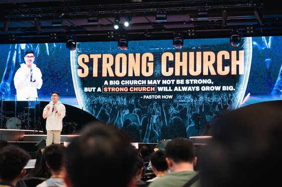 Senior Pastor Garrett Lee sharing about GenerationS and StronG church at GenerationS Pastors Conference in Heart of God Church Singapore